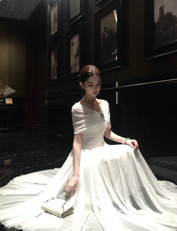 Classic White Off‑The‑Shoulder A‑Line Prom Dress With Ruched Bodice & Rhinestone Brooch Detail AD838