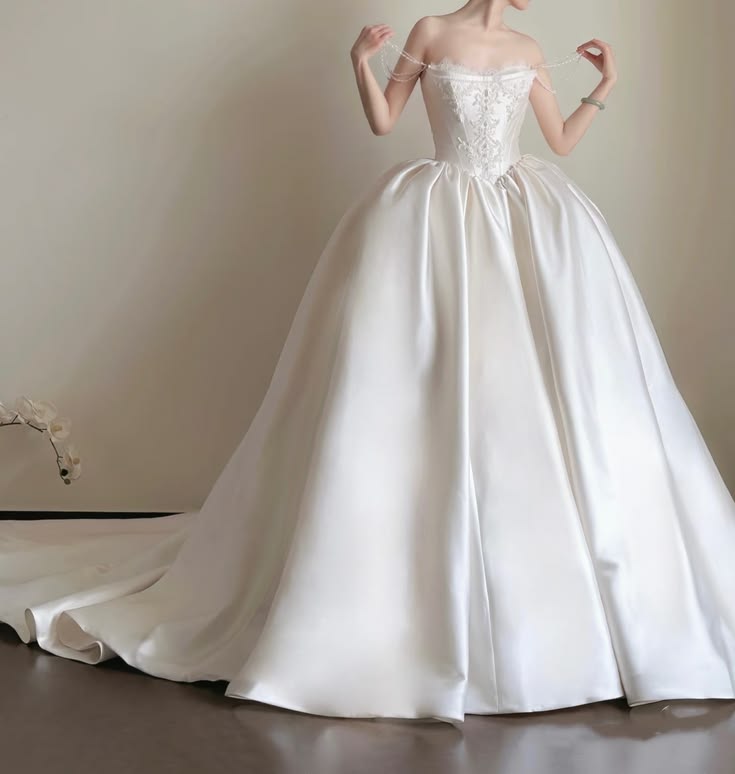 Delicate Ivory Off Shoulder Satin Ball Gown Wedding Dress With Lace-Trimmed Corset Bodice,Pearl Beading And Cathedral Train AE118