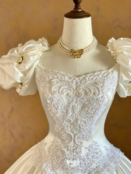 Elegant Ivory Puffed Short Sleeve Sweetheart Heavy Floral Lace Corset Mini Floral Accent Lace Ruffle Hem Satin Ballgown Wedding Dress AE146