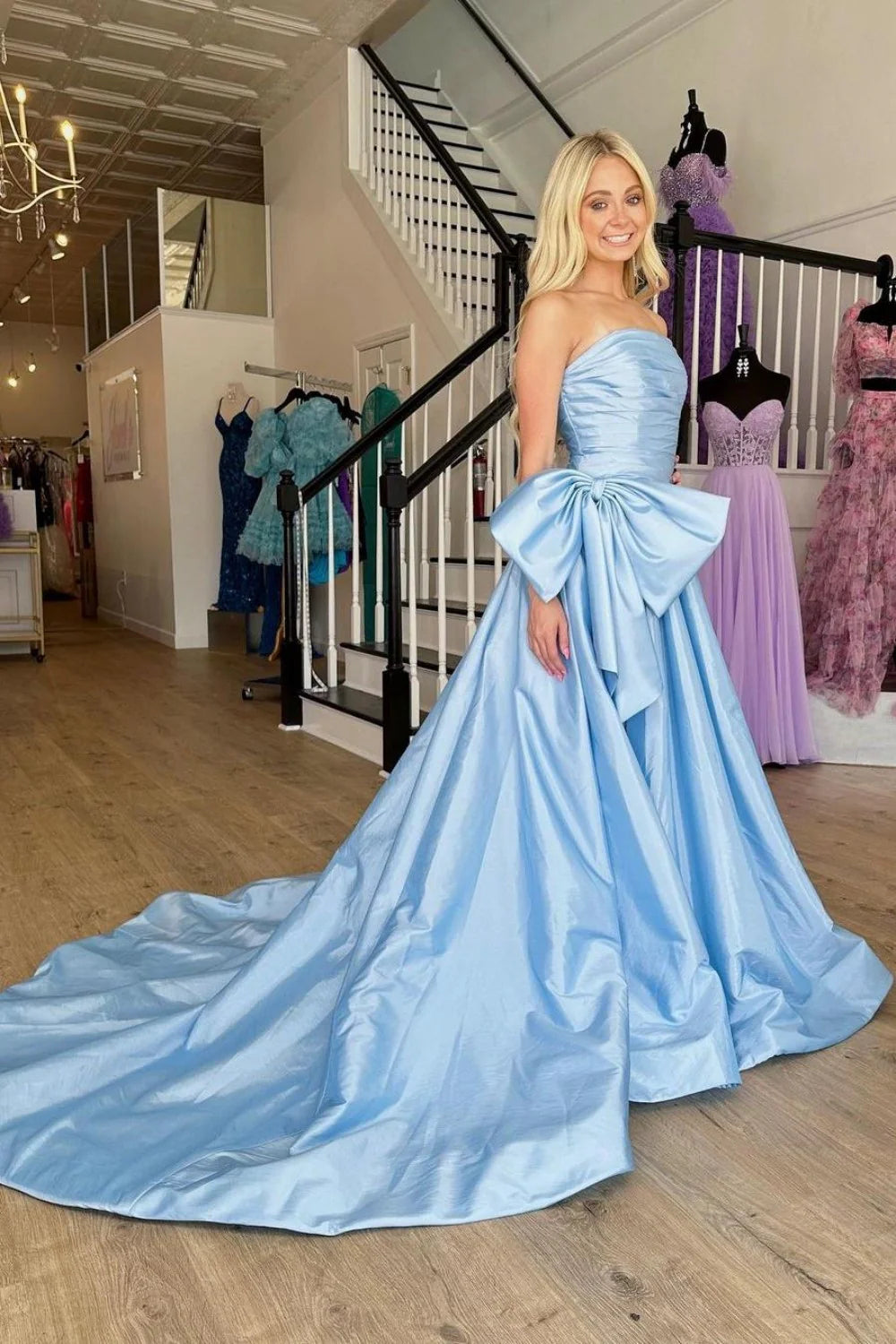 Light Blue Satin Prom Dress With Dramatic Bow And Flowy Skirt AD621