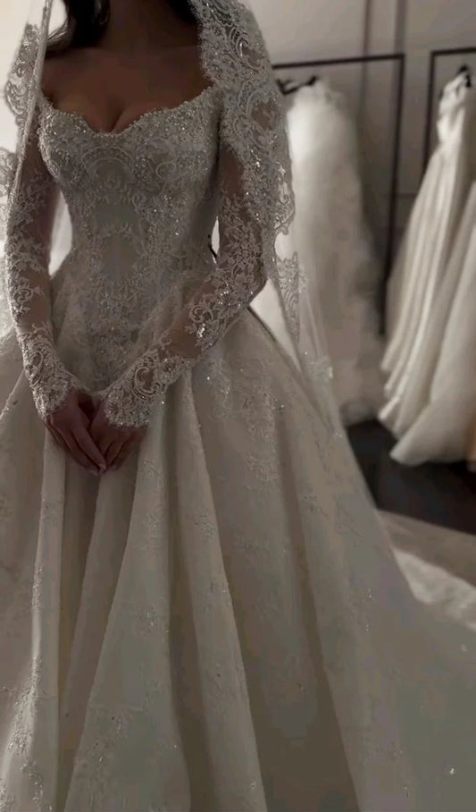 Opulent Ivory Off-The-Shoulder Beaded Lace A Line Wedding Dress With Long Lace Sleeves & Cathedral Train AE021