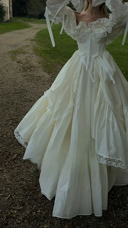 Romantic Off-The-Shoulder Tiered A Line Long Sleeves Wedding Dress With Lace Trim,Bow& Sweep Train AE023