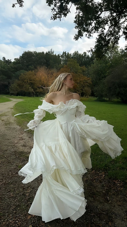 Romantic Off-The-Shoulder Tiered A Line Long Sleeves Wedding Dress With Lace Trim,Bow& Sweep Train AE023