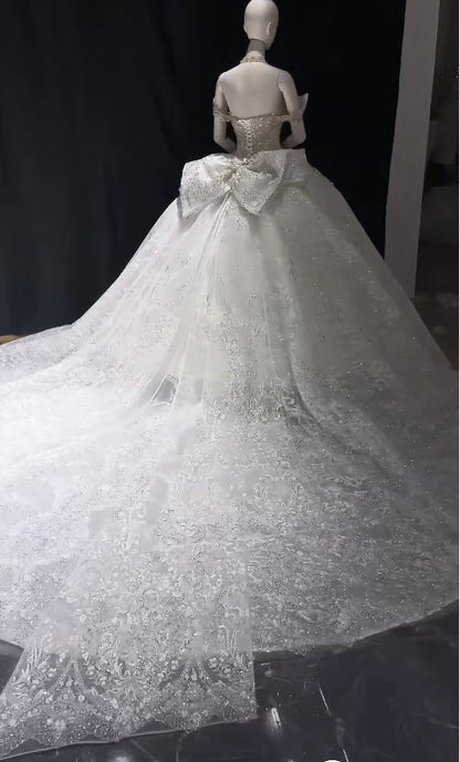 Regal White Off-The-Shoulder Lace Beaded Ball Gown Wedding Dress With Cathedral Train & Big Back Bow AE039