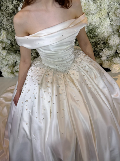 Luxury Ivory Off Shoulder Ruched Bodice Pearl Beaded Satin Ball Gown Wedding Dress With Chapel Train AE081