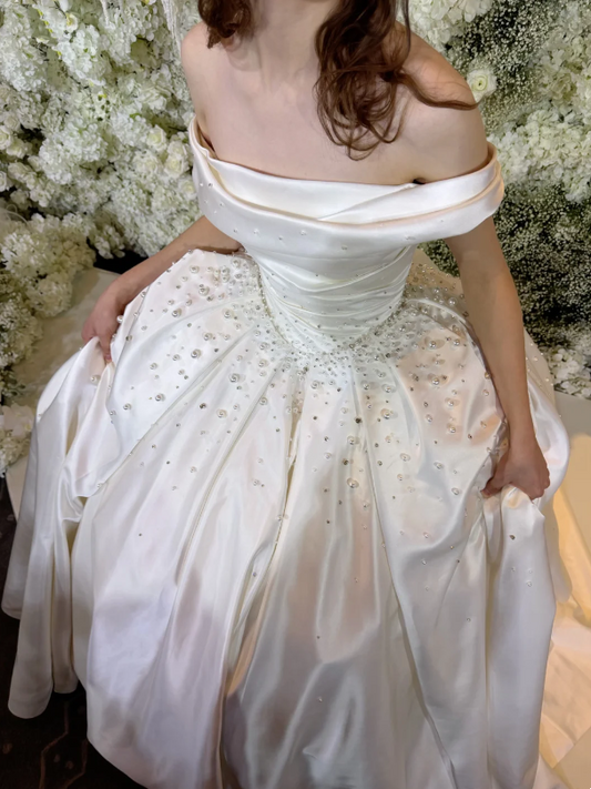 Luxury Ivory Off Shoulder Ruched Bodice Pearl Beaded Satin Ball Gown Wedding Dress With Chapel Train AE081