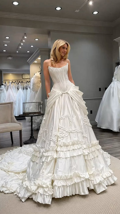 Regal Strapless Ivory Satin A Line Wedding Dress With Tiered Ruffles,Ornate Corset Detail And Chapel Train AE108