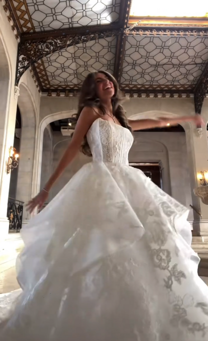 Chic White Strapless Floral Lace Ball Gown Wedding Dress With Tiered Voluminous Skirt And Chapel Train AE111