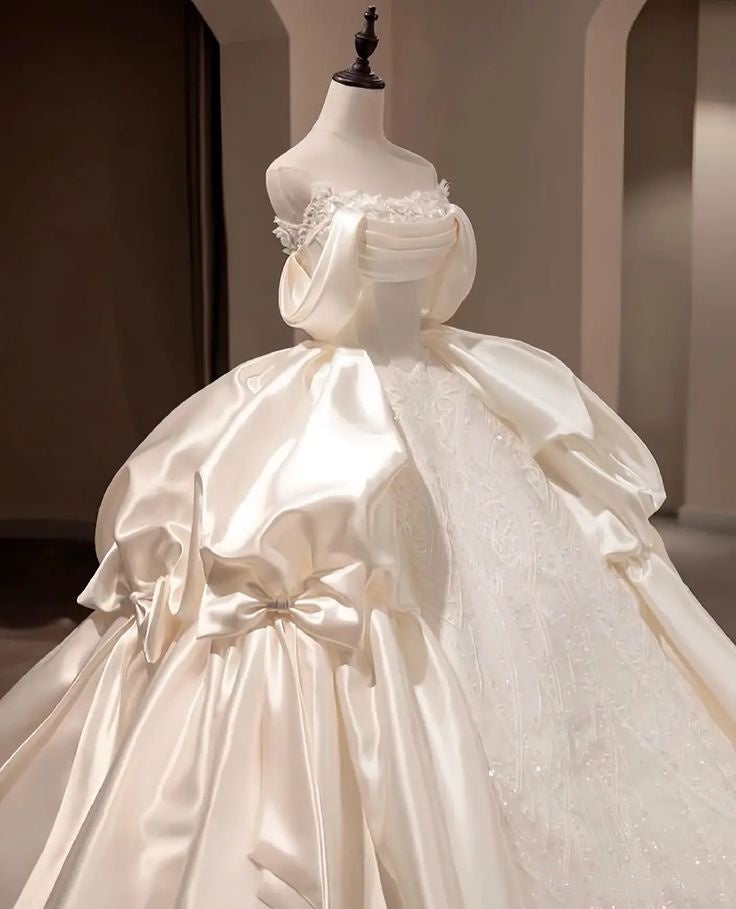 Regal Ivory Off Shoulder Satin & Beaded Lace Ball Gown Wedding Dress With Dramatic Satin Bow And Cathedral Train AE116