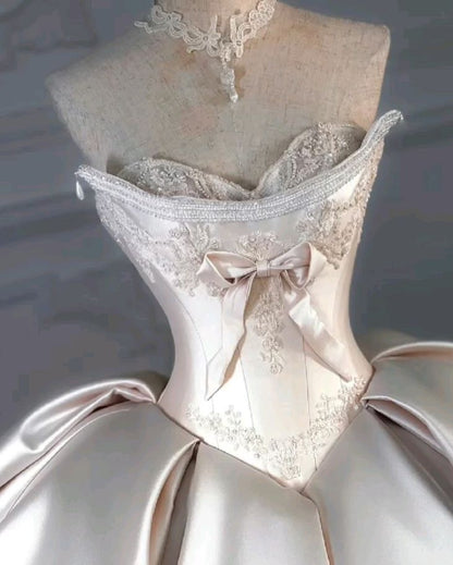 Regal Ivory Strapless Satin Ball Gown Wedding Dress With Hand-Embroidered Lace,Beaded Trim And Bow Detail AE117