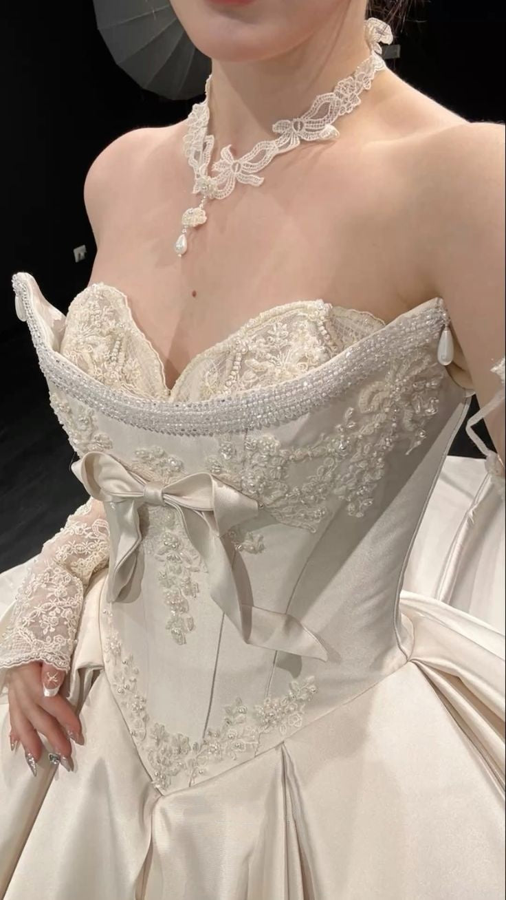 Regal Ivory Strapless Satin Ball Gown Wedding Dress With Hand-Embroidered Lace,Beaded Trim And Bow Detail AE117