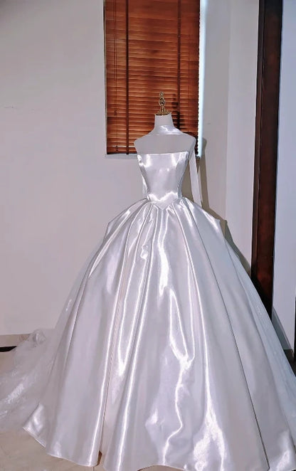 Sleek Minimal Satin White Strapless Ball Gown Wedding Dress With Side Lace And Chapel Train AE126