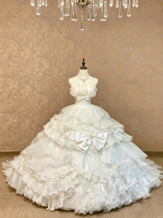 Gorgeous White Strapless Ruffle Trim Corset Bodice Large Satin Bow Accent Multi-Tier Glitter Tulle Ruffle Ballgown Wedding Dress With Chapel Train AE139