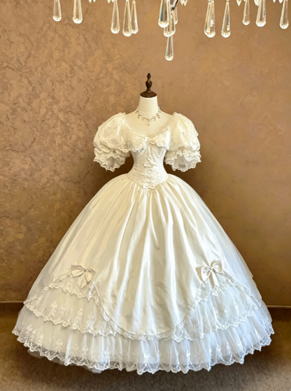 Elegant Ivory Off The Shoulder Puffed Lace Short Sleeve Corset Satin Bow Multi-Tier Lace Ruffle Ballgown Long Wedding Dress AE147