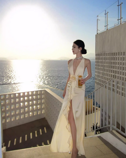Graceful Deep V-Neck Lustrous Fabric Maxi Dress Flowy Ruffles Hem High-Slit Halter Dress AP1132
