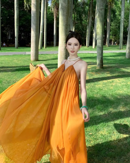 Ethereal Cross-Back Coastal Vacays Flowy Maxi Dress Chic Yellow Outdoor Trips Swing Hem Halter Long Dress AP1463