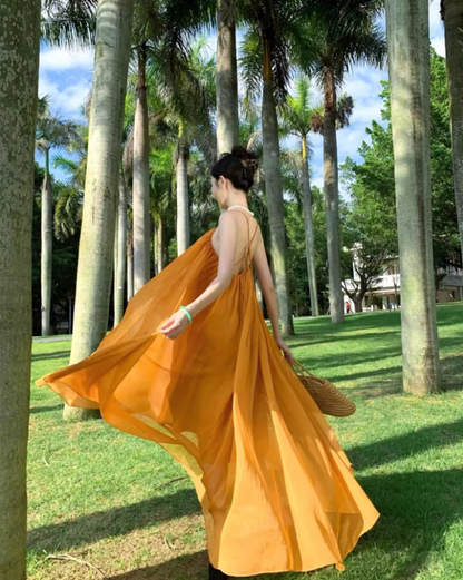Ethereal Cross-Back Coastal Vacays Flowy Maxi Dress Chic Yellow Outdoor Trips Swing Hem Halter Long Dress AP1463