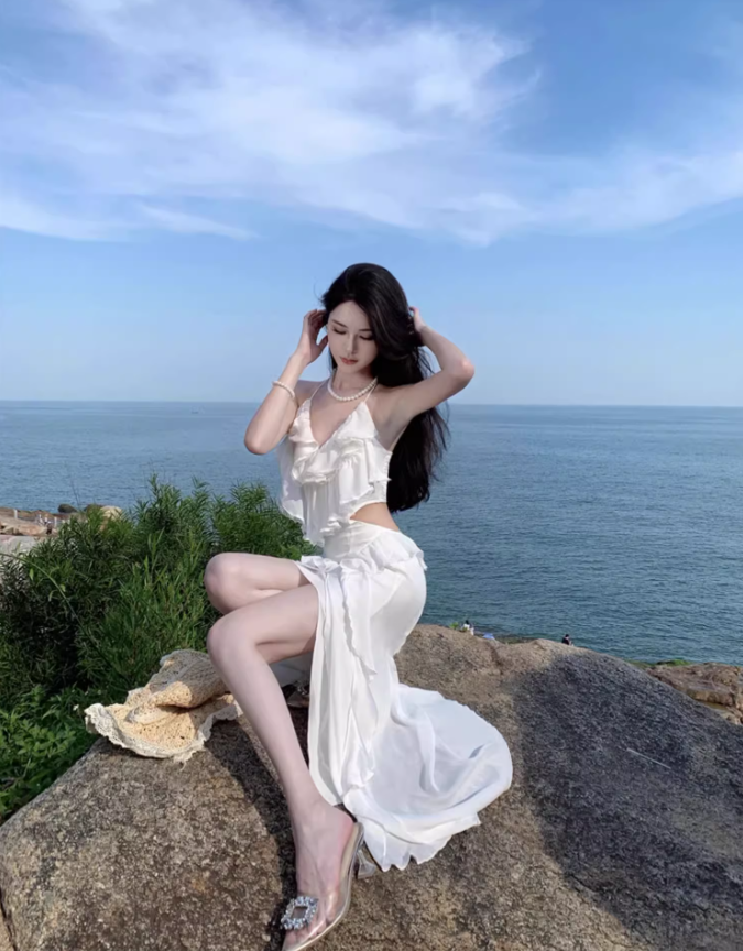 Ethereal Cascade Ruffles Trimmed White Maxi Dress Vogue Flowy Tie-Back Cutout Waist High-Slit Halter Long Dress AP1548