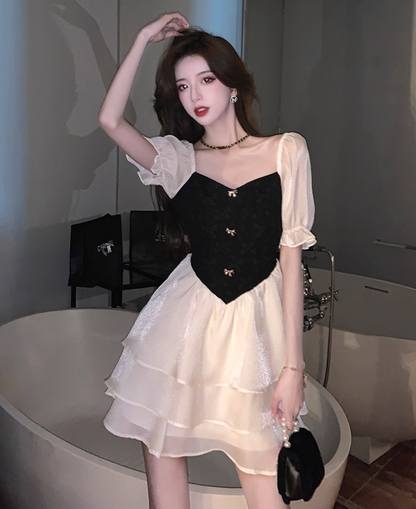 Exquisite Party-Ready Tiered Ruffles Hem Sheen Tulle Mini Skirt Gothic-Inspired Black & White Splicing Puffy Sleeve Short Dress AP1725