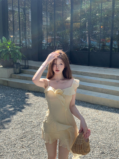 Ethereal Light Yellow Asymmetric Spaghetti Strap Mini Dress Cute 3D Floral Accent Ruffles Hem Short Dress AP2080