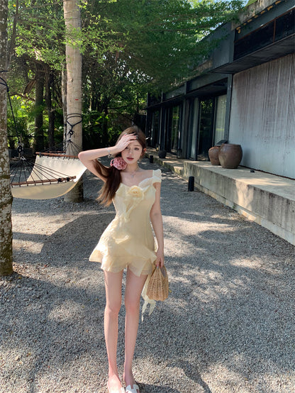 Ethereal Light Yellow Asymmetric Spaghetti Strap Mini Dress Cute 3D Floral Accent Ruffles Hem Short Dress AP2080