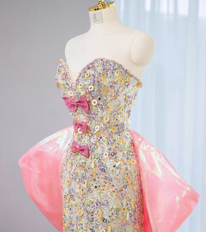 Glamorous Strapless Glittering Sequins Accent Maxi Dress Luxurious Hi-Lo Hem Oversized Bow Long Train Side Slit Prom Dress AP2106