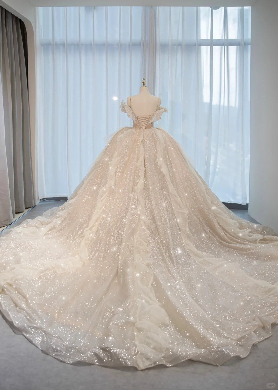 Luxurious Sparkly Cascade Tulle Hem Off-Shoulder Bridal Dress Alluring Crystal Trim Lace-Up Back A-Line Wedding Dress AP2162