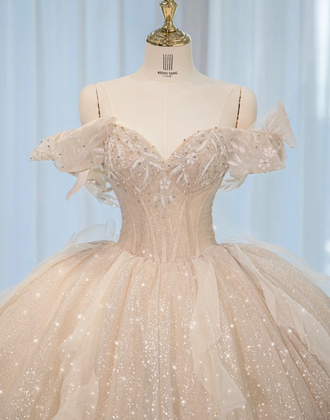 Luxurious Sparkly Cascade Tulle Hem Off-Shoulder Bridal Dress Alluring Crystal Trim Lace-Up Back A-Line Wedding Dress AP2162