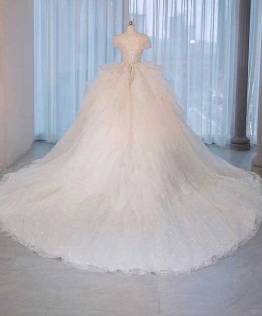 Intricate Beadwork & Sparkle Crystal Accent Sheer Mesh Splicing Round Neck Bridal Dress Charming Short Sleeve A-Line Ruffled Tulle Layered Wedding Dress AP2169