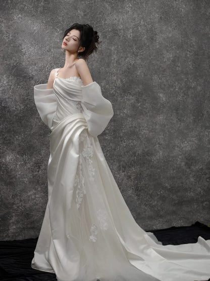 Glamorous One-Shoulder Bow Back 3D Floral Accent Maxi Bridal Dress Elegant Satin Drape Bodice Cascade Tulle Hem Wedding Dress AP2200