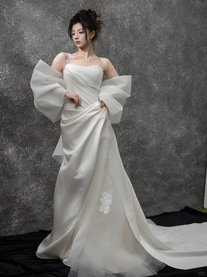 Glamorous One-Shoulder Bow Back 3D Floral Accent Maxi Bridal Dress Elegant Satin Drape Bodice Cascade Tulle Hem Wedding Dress AP2200