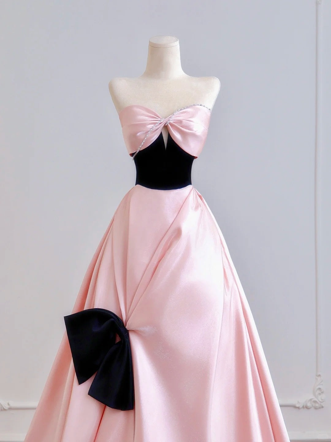 Luxurious Beading Strapless Pink Satin Ruched Evening Maxi Dress Cute Cutout Black Bodice Big Bow Accent Prom Dress AP2222