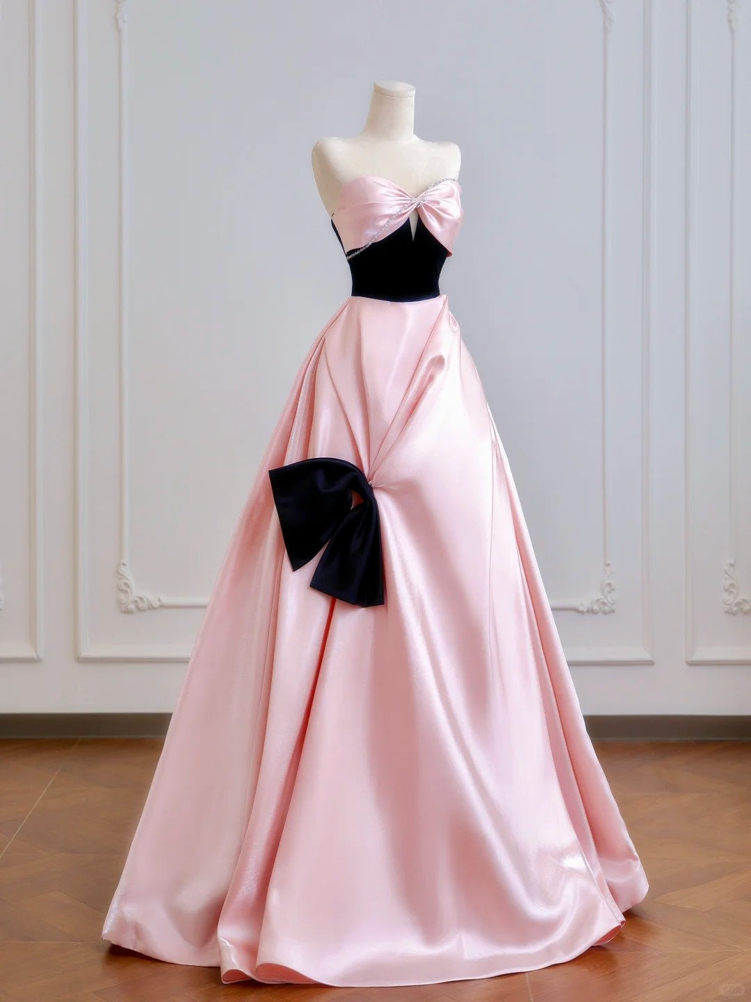 Luxurious Beading Strapless Pink Satin Ruched Evening Maxi Dress Cute Cutout Black Bodice Big Bow Accent Prom Dress AP2222
