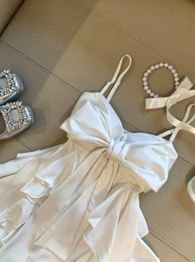 Romantic White Spaghetti Strap Oversized Front Satin Big Bow Multi-Layer Asymmetrical Ruffle Satin Skirt A Line Short Homecoming Dress AS1090
