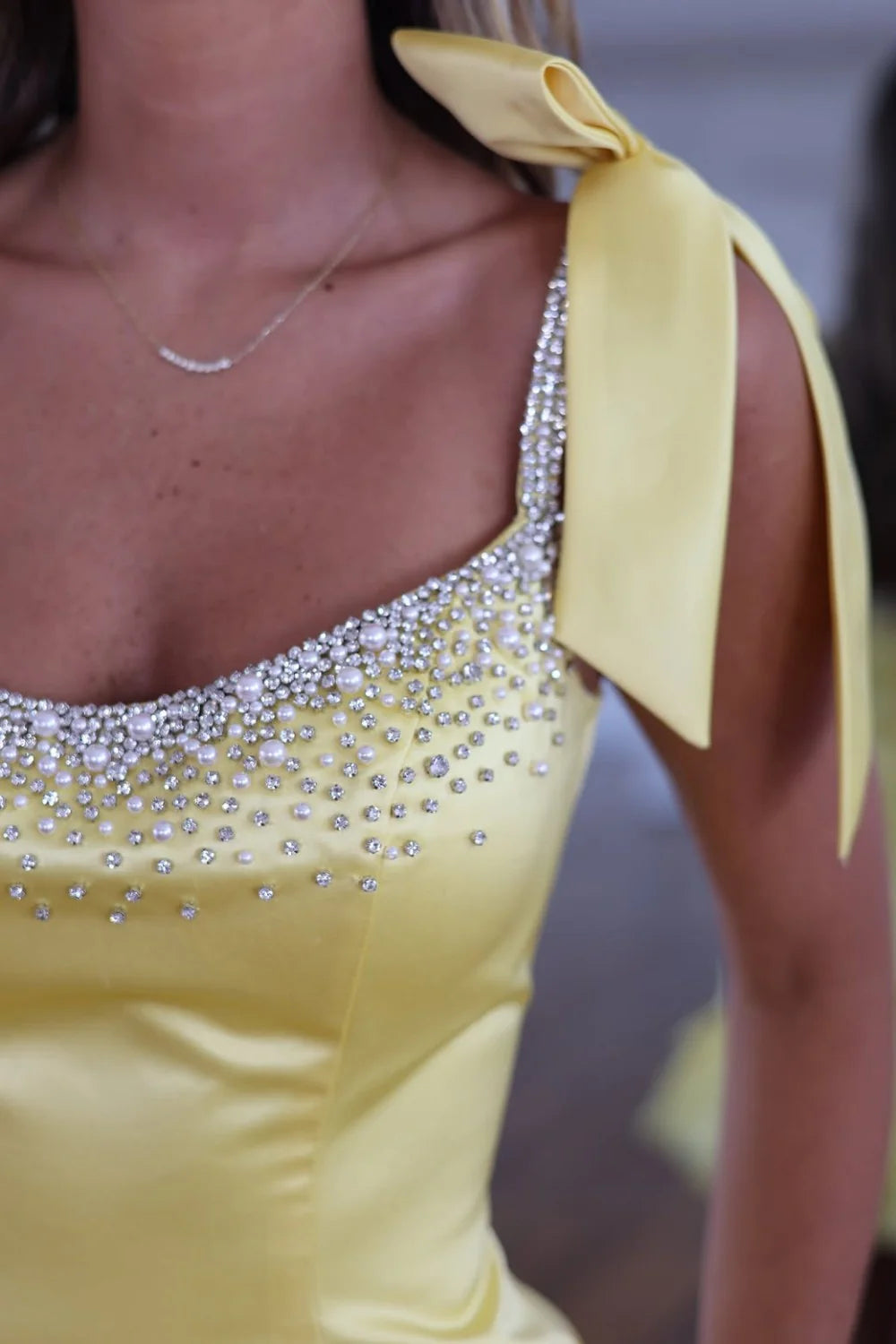 Elegant Yellow Bows Straps Satin Short Bodycon Homecoming Dress With Rhinestone Bodice And Ruffle Hem AS1312