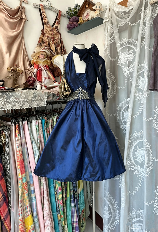 Opulent Navy Blue Satin Halter Neck Rhinestone Beaded Waist A‑Line Midi Homecoming Dress With Detachable Chiffon Neck Bow Sash AS2442