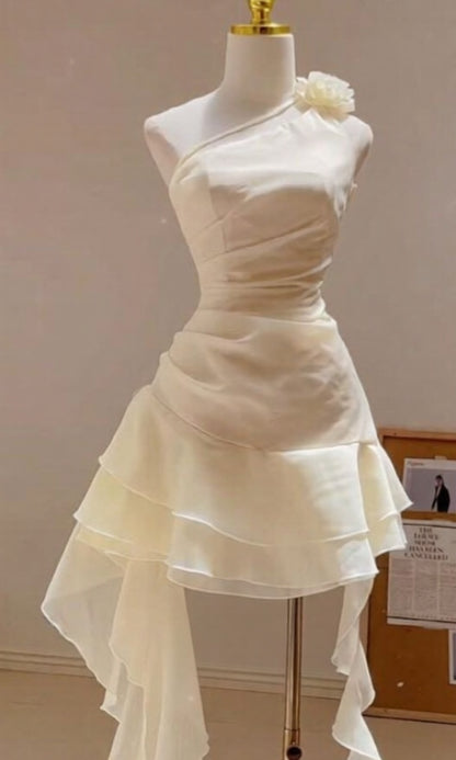 Elegant White One‑Shoulder Asymmetrical Ruffled Short Homecoming Dress With 3D Floral Shoulder Detail AS522