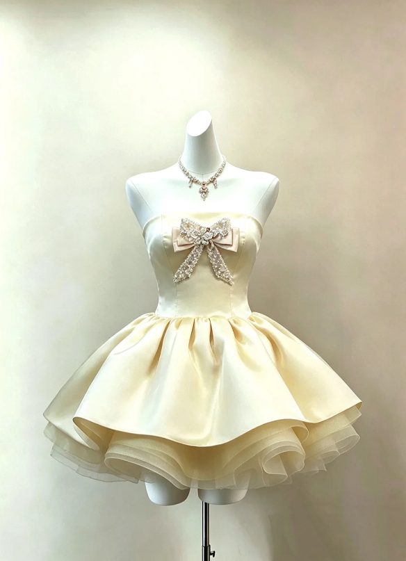 Soft Light Yellow Strapless Satin Short A Line Homecoming Dress With Rhinestone Front Bow And Multi-Layer Ruffled Tulle Flare Skirt AS869